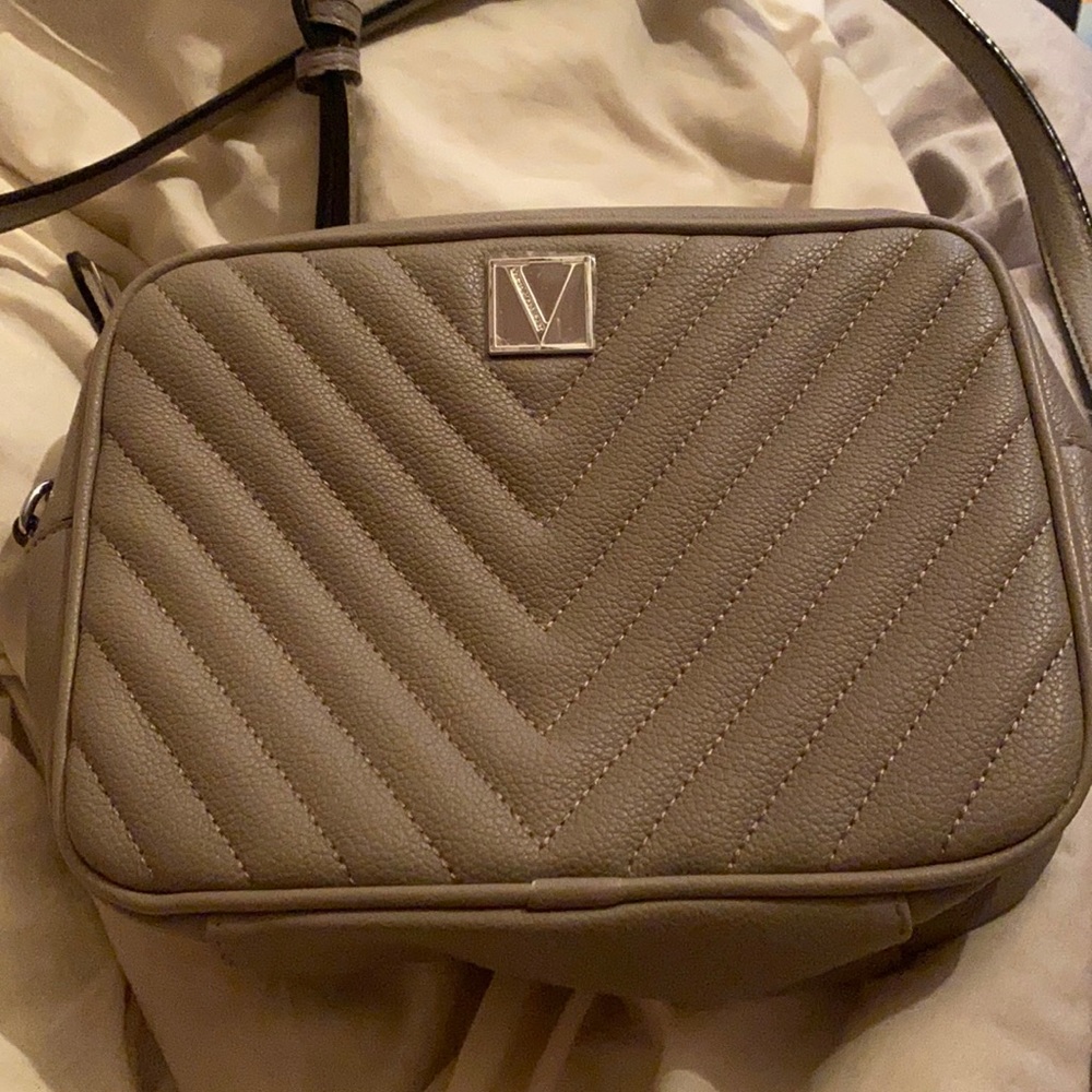 Grey vicctoria’s secret purse.